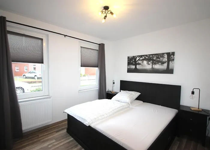 Moderne Mit Terrasse & Garten Moewennest Iii דירה אמדן