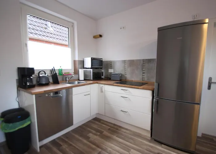 Moderne Mit Terrasse & Garten Moewennest Iii דירה אמדן